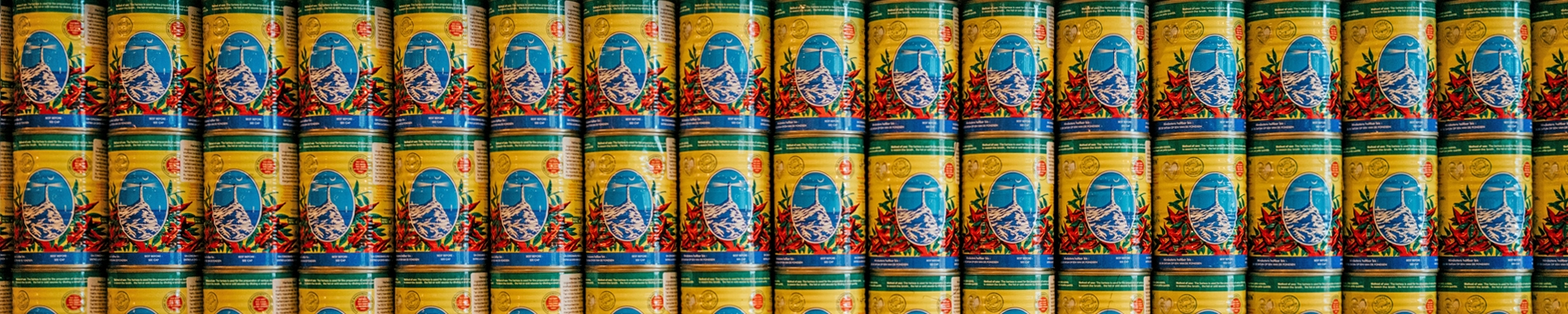 Decorative image featuring stacked cans